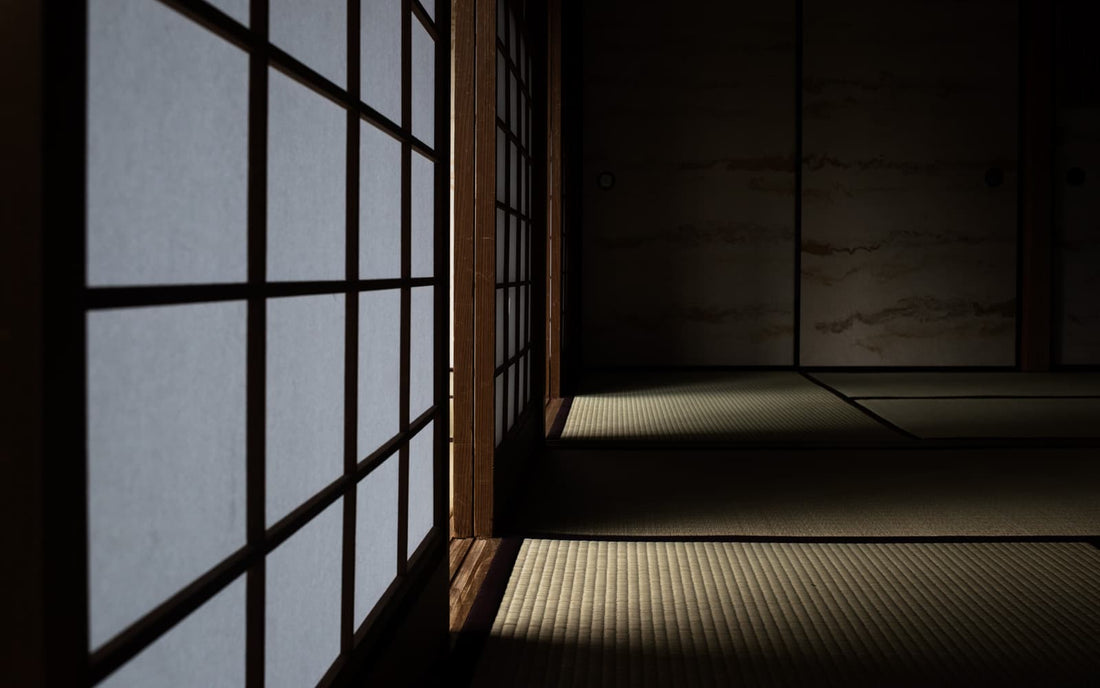 A serene Japanese room with tatami mats and shoji screens, reflecting the calm and beauty of a well-chosen tatami floor.